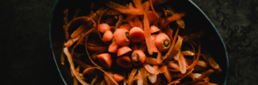 carrot scraps and peelings in a bowl