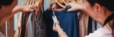 two-people-shopping-for-clothing