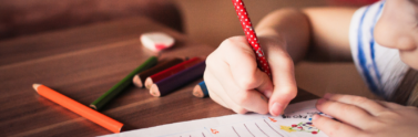 close-up-of-girl-writing