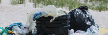 Overflowing-garbage-cans-filled-with-plastic