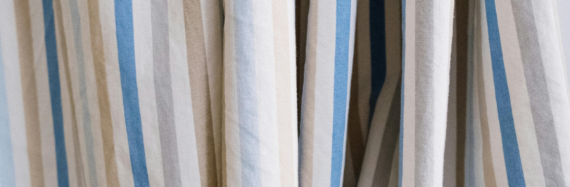 close-up-of-striped-curtain