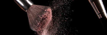 cosmetics-makeup-brushes-and-powder-dust