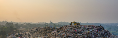 landfill-with-excavator