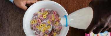 person-pouring-milk-from-bottle