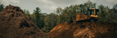backhoe in soil