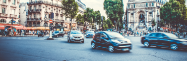 Cars driving in European city